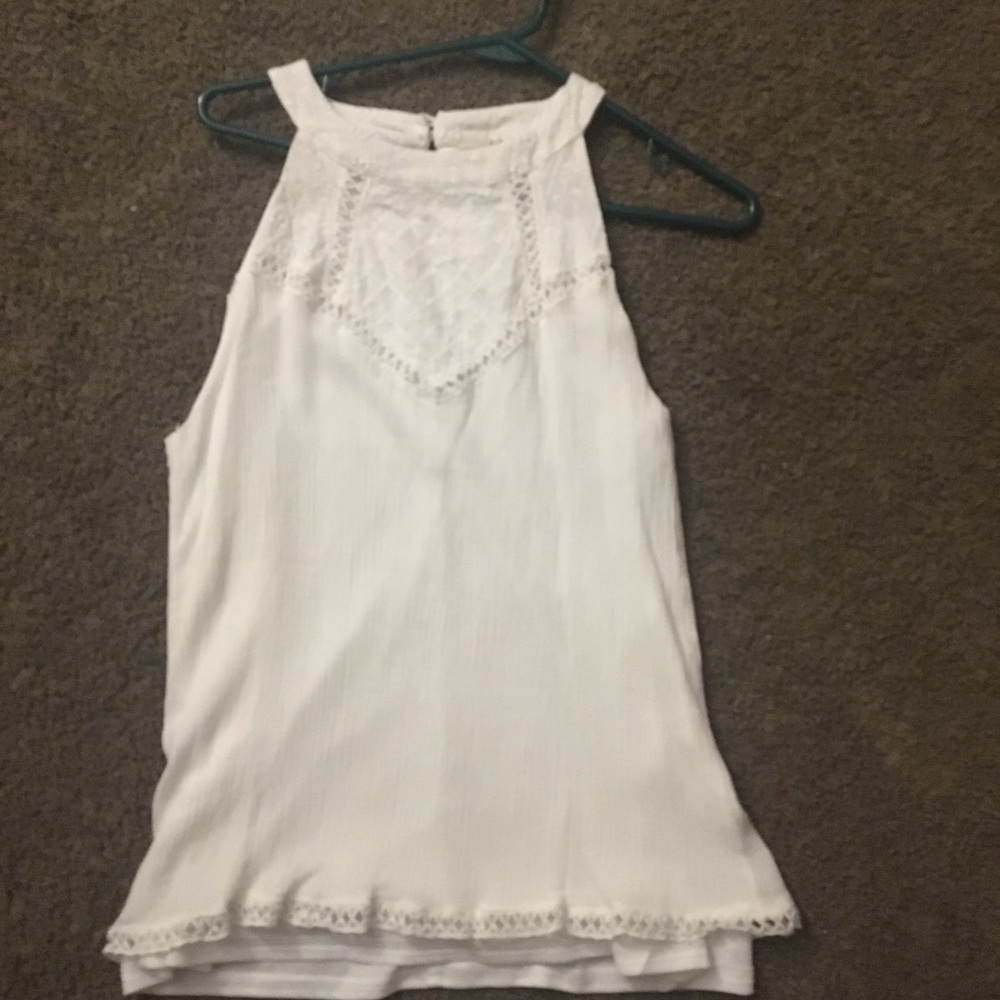 White sleeveless top